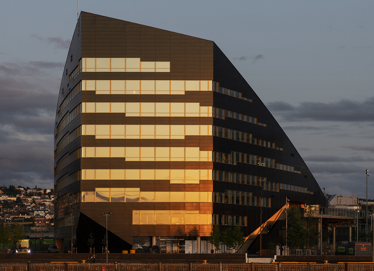 Entra Office Building at night outside view