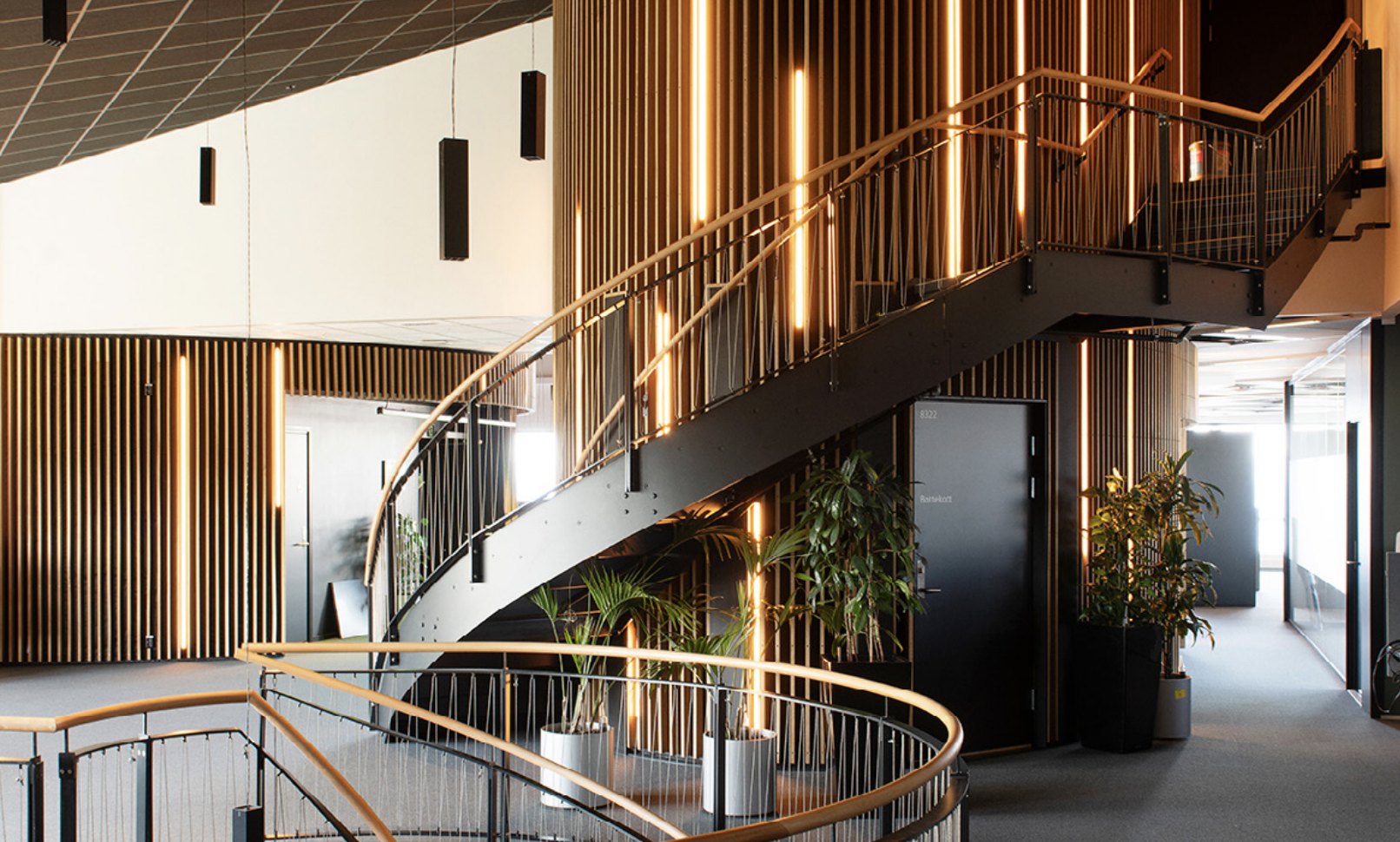 Entra Office staircase with plants