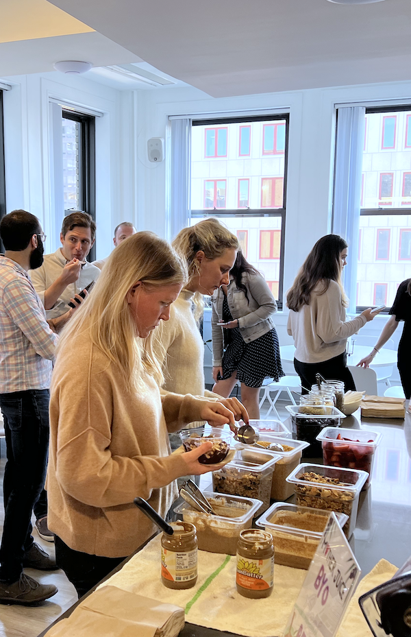 Employees making acai bowls