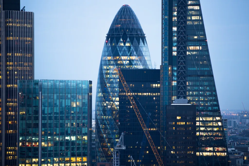 City of London business aria view at sunset. City of London the leading financial centre in the Europe.