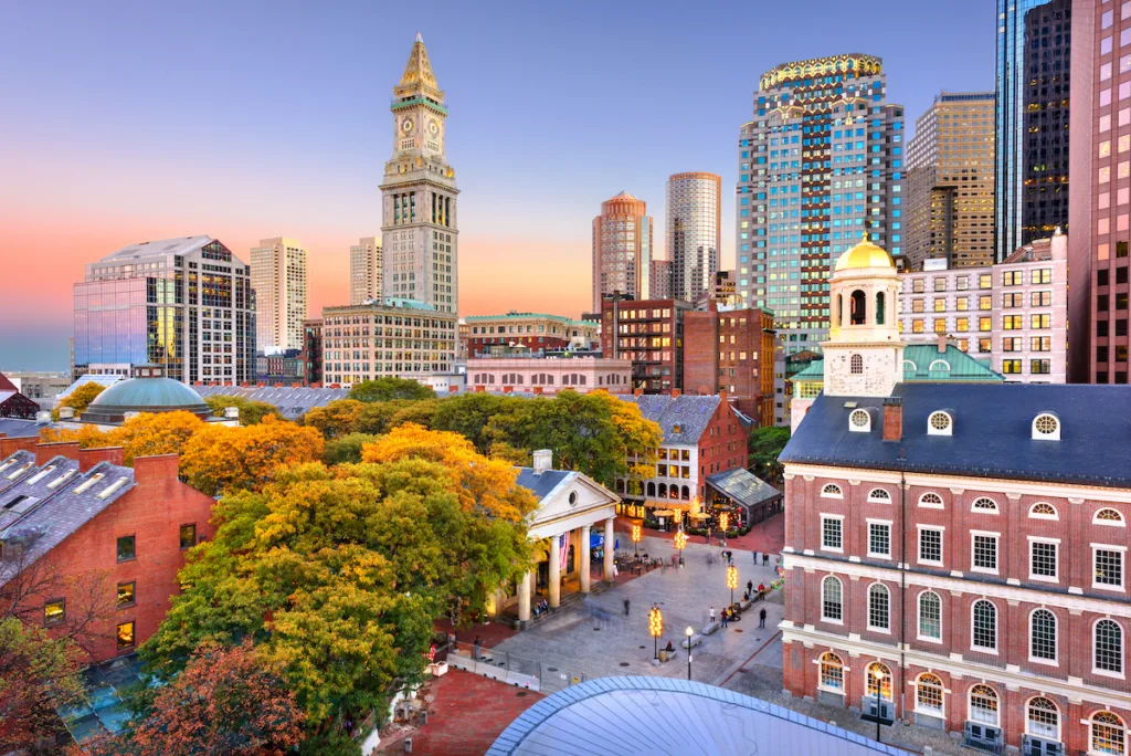 Boston, Massachusetts, USA skyline with Faneuil Hall and Quincy Market at dusk.
