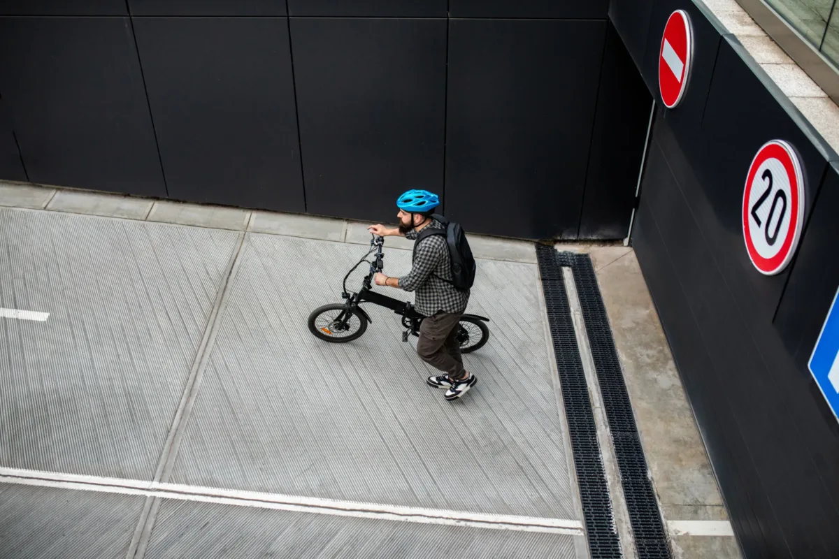 Casually clothed man on an electric bicycle